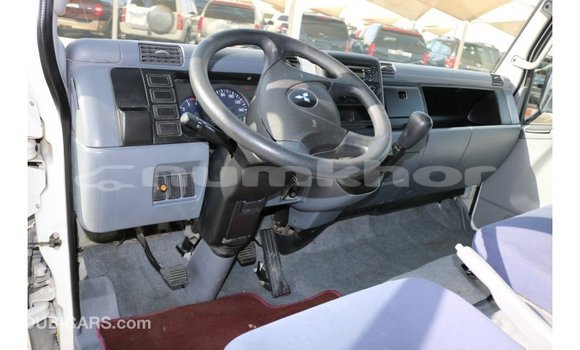 Buy Import Mitsubishi Carisma White Car in Import - Dubai in Bumthang