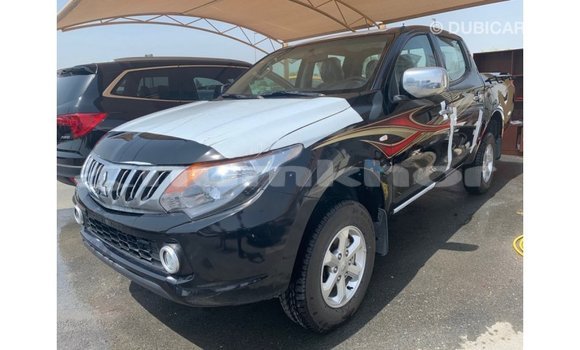 Buy Import Mitsubishi L200 Black Car in Import - Dubai in Bumthang Buy Import Mitsubishi L200 Black Car in Import - Dubai in Bumthang