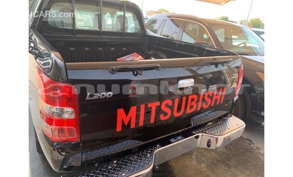 Buy Import Mitsubishi L200 Black Car in Import - Dubai in Bumthang Buy Import Mitsubishi L200 Black Car in Import - Dubai in Bumthang
