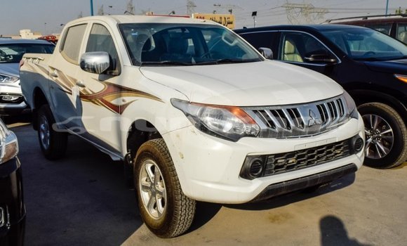 Buy Import Mitsubishi L200 White Car in Import - Dubai in Bumthang Buy Import Mitsubishi L200 White Car in Import - Dubai in Bumthang