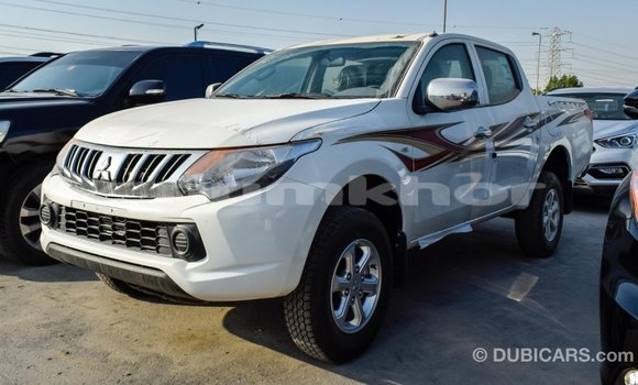 Buy Import Mitsubishi L200 White Car in Import - Dubai in Bumthang Buy Import Mitsubishi L200 White Car in Import - Dubai in Bumthang