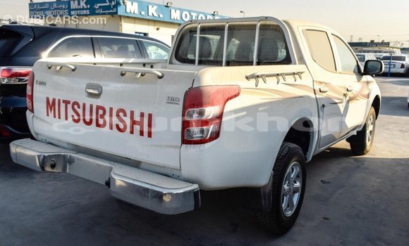 Buy Import Mitsubishi L200 White Car in Import - Dubai in Bumthang Buy Import Mitsubishi L200 White Car in Import - Dubai in Bumthang