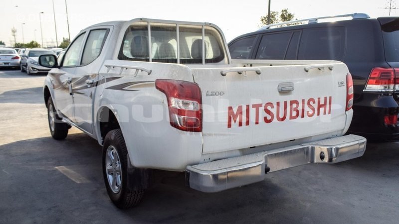 Big with watermark mitsubishi l200 bumthang import dubai 1828