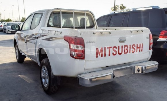 Buy Import Mitsubishi L200 White Car in Import - Dubai in Bumthang Buy Import Mitsubishi L200 White Car in Import - Dubai in Bumthang