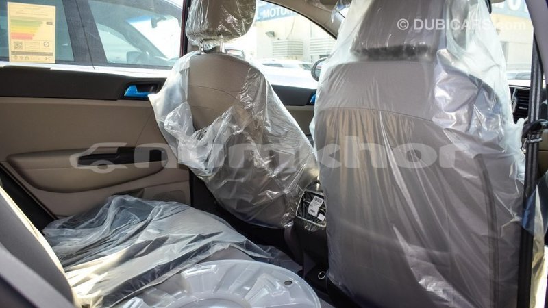 Big with watermark kia sportage bumthang import dubai 1876