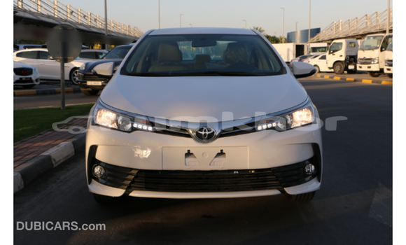 Buy Import Toyota Corolla White Car in Import - Dubai in Bumthang Buy Import Toyota Corolla White Car in Import - Dubai in Bumthang