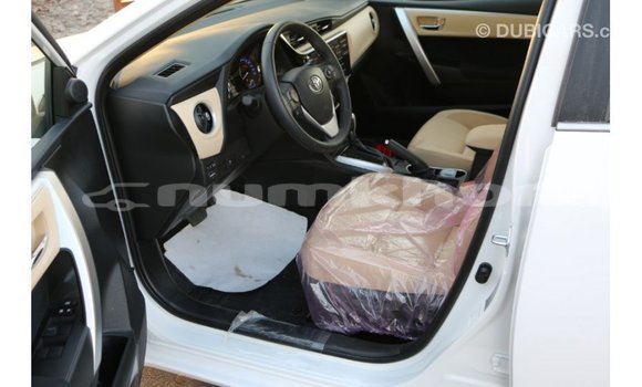 Buy Import Toyota Corolla White Car in Import - Dubai in Bumthang Buy Import Toyota Corolla White Car in Import - Dubai in Bumthang