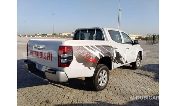 Buy Import Mitsubishi L200 White Car in Import - Dubai in Bumthang Buy Import Mitsubishi L200 White Car in Import - Dubai in Bumthang