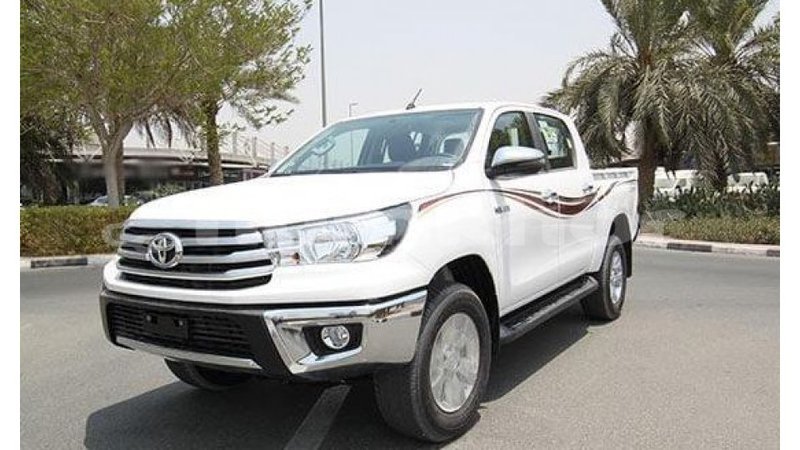 Big with watermark toyota hilux bumthang import dubai 2124