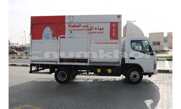 Buy Import Mitsubishi Carisma White Car in Import - Dubai in Bumthang