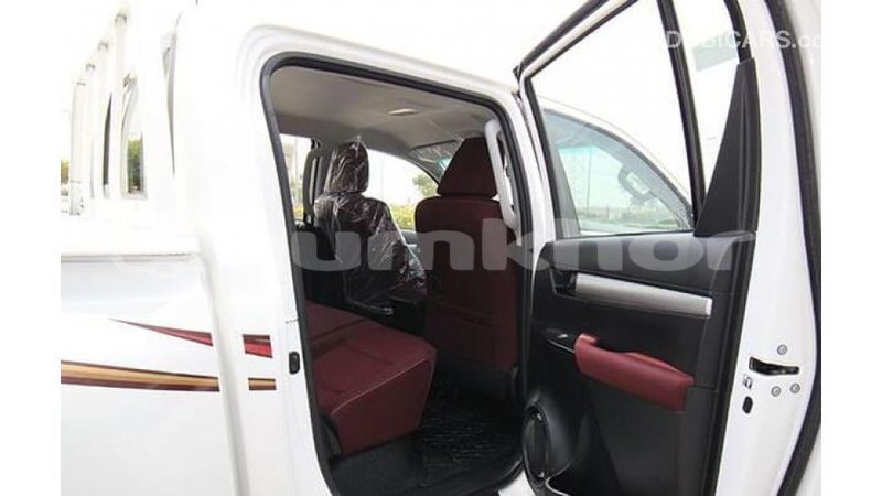 Big with watermark toyota hilux bumthang import dubai 2124