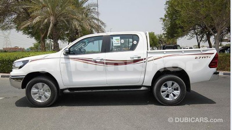 Big with watermark toyota hilux bumthang import dubai 2124