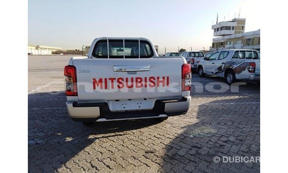 Buy Import Mitsubishi L200 White Car in Import - Dubai in Bumthang Buy Import Mitsubishi L200 White Car in Import - Dubai in Bumthang