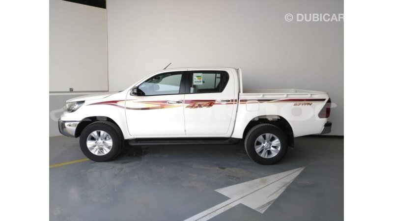 Big with watermark toyota hilux bumthang import dubai 2156
