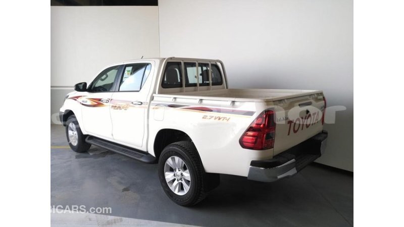 Big with watermark toyota hilux bumthang import dubai 2156
