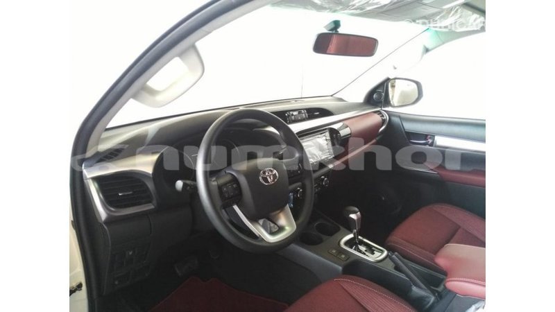 Big with watermark toyota hilux bumthang import dubai 2156