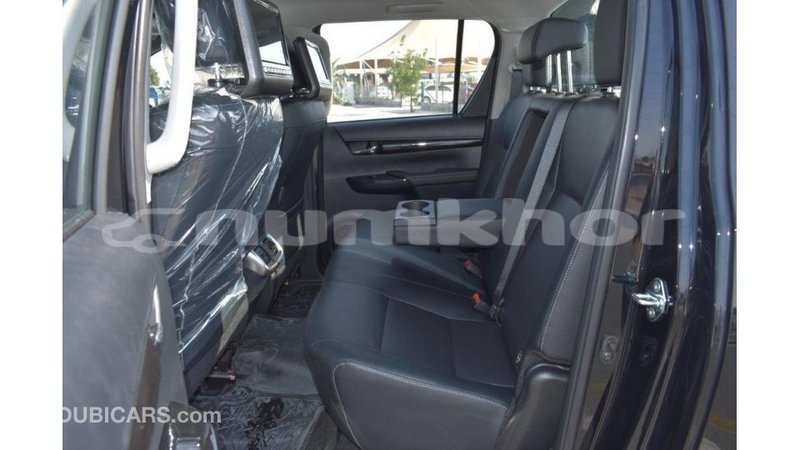 Big with watermark toyota hilux bumthang import dubai 2163