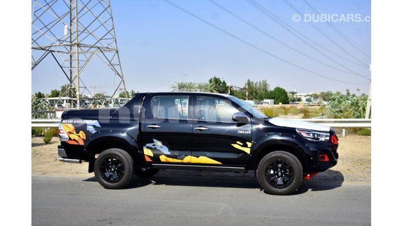 Big with watermark toyota hilux bumthang import dubai 2163