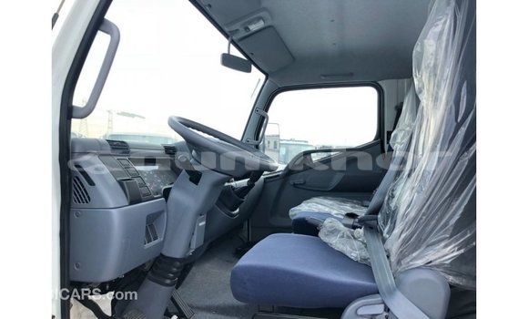 Buy Import Mitsubishi Carisma White Car in Import - Dubai in Bumthang