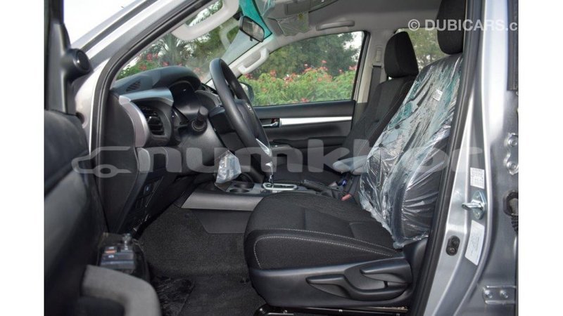 Big with watermark toyota hilux bumthang import dubai 2182