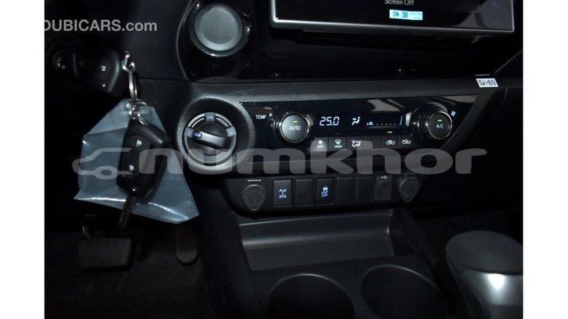 Big with watermark toyota hilux bumthang import dubai 2182