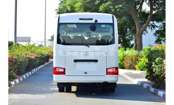 Buy Import Toyota Coaster White Car in Import - Dubai in Bumthang Buy Import Toyota Coaster White Car in Import - Dubai in Bumthang