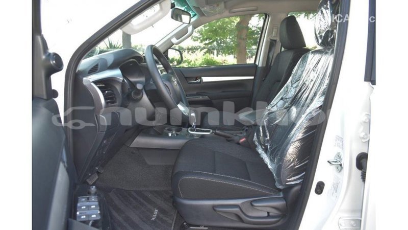 Big with watermark toyota hilux bumthang import dubai 2203