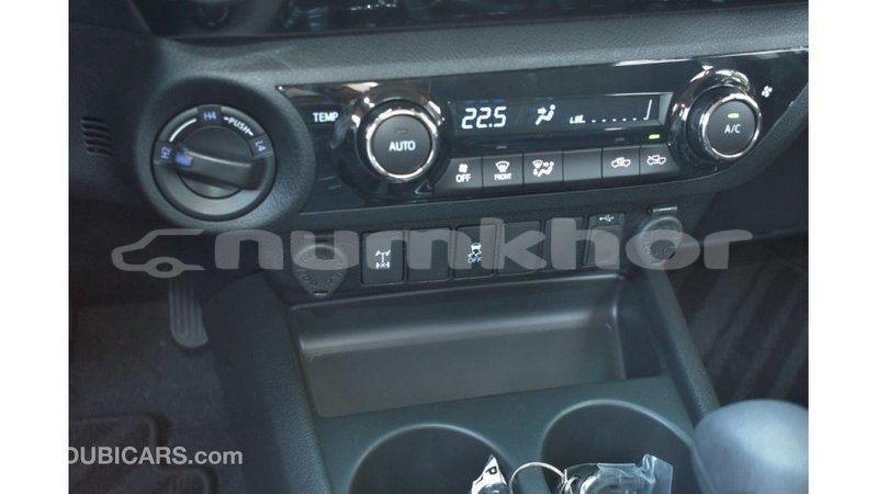 Big with watermark toyota hilux bumthang import dubai 2203