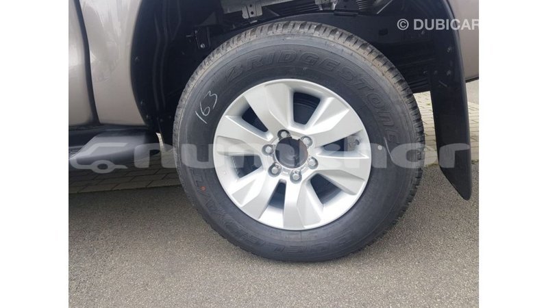 Big with watermark toyota hilux bumthang import dubai 2273