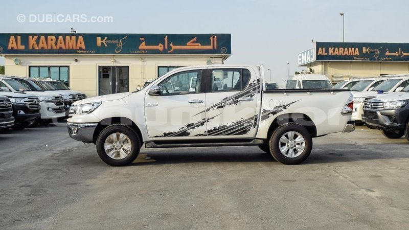 Big with watermark toyota hilux bumthang import dubai 2284