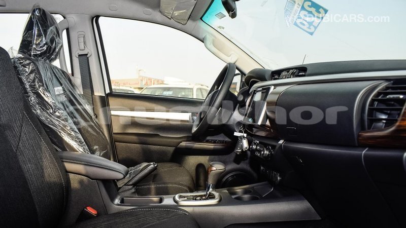 Big with watermark toyota hilux bumthang import dubai 2284