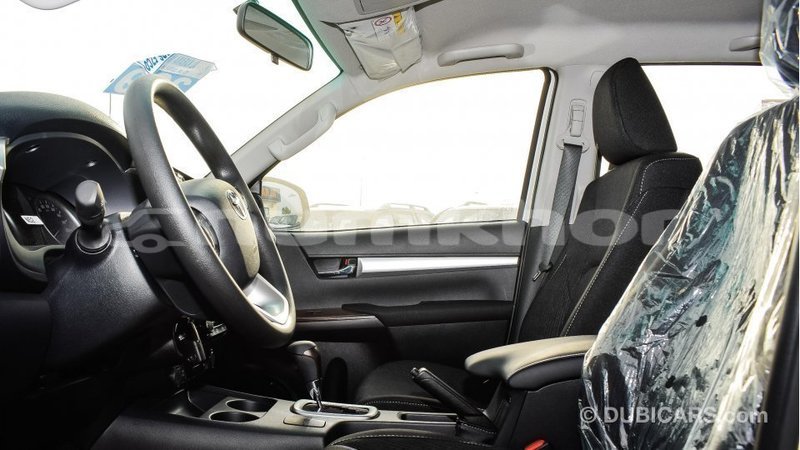 Big with watermark toyota hilux bumthang import dubai 2284