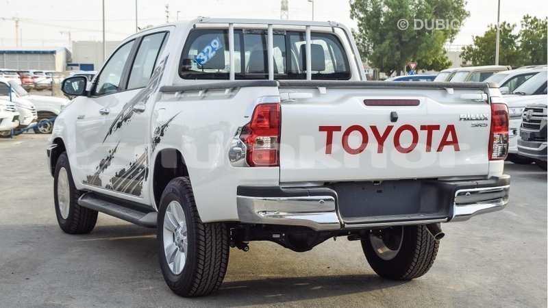 Big with watermark toyota hilux bumthang import dubai 2284