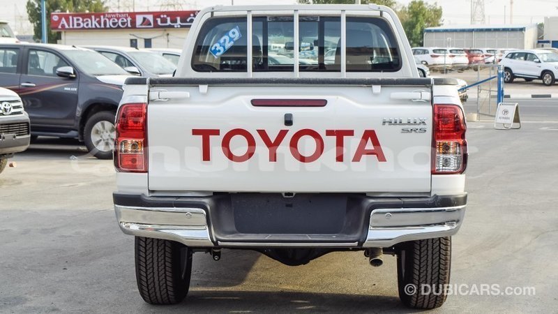 Big with watermark toyota hilux bumthang import dubai 2284