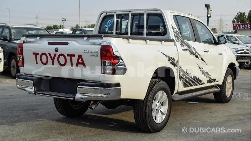 Big with watermark toyota hilux bumthang import dubai 2284