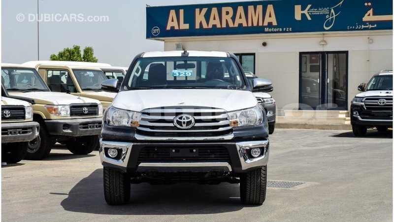 Big with watermark toyota hilux bumthang import dubai 2286