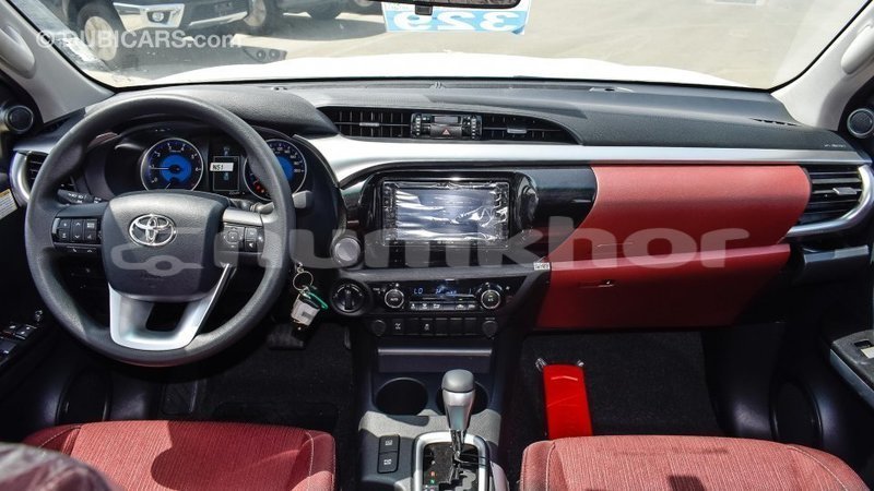 Big with watermark toyota hilux bumthang import dubai 2286