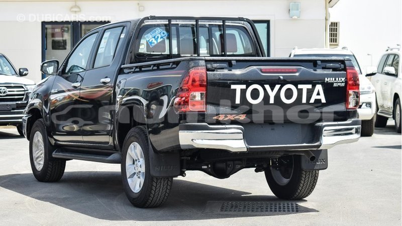 Big with watermark toyota hilux bumthang import dubai 2286