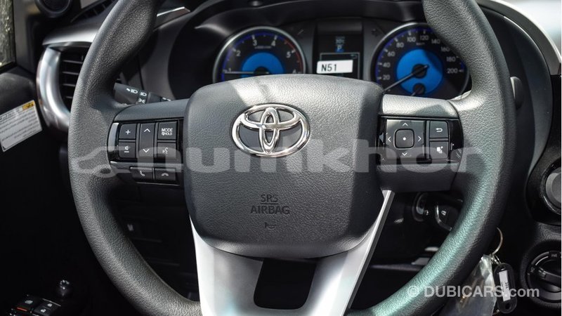 Big with watermark toyota hilux bumthang import dubai 2287