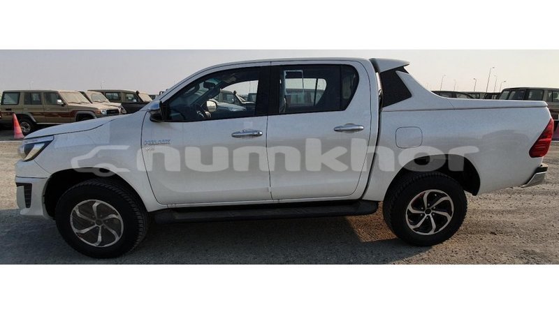 Big with watermark toyota hilux bumthang import dubai 2324