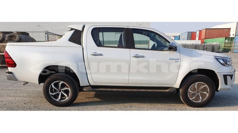 Big with watermark toyota hilux bumthang import dubai 2324