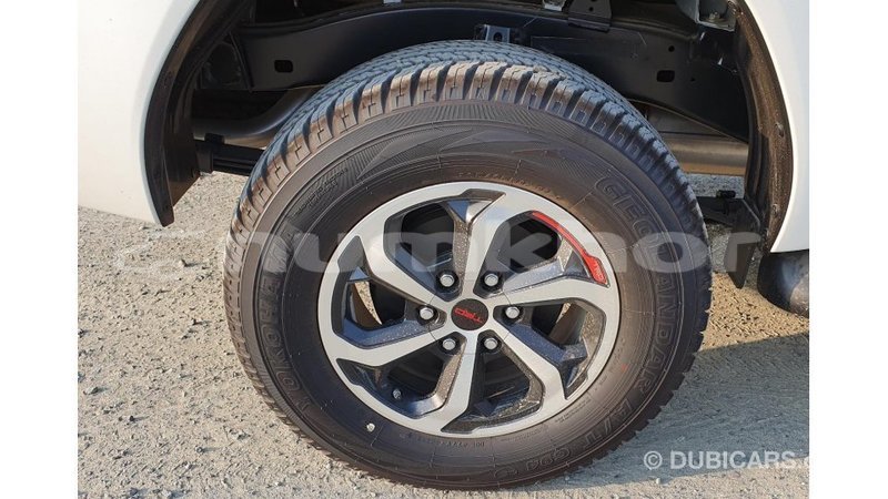 Big with watermark toyota hilux bumthang import dubai 2324