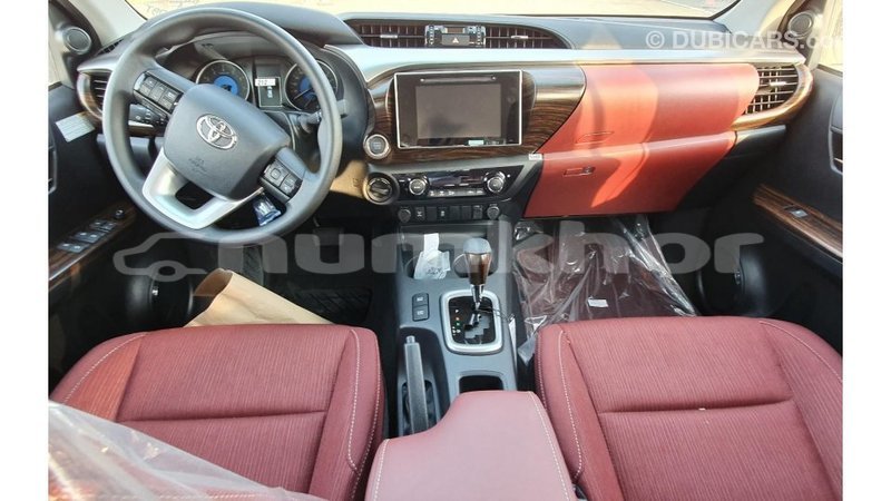 Big with watermark toyota hilux bumthang import dubai 2324