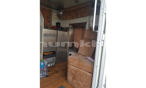 Buy Import Kia Carens White Car in Import - Dubai in Bumthang Buy Import Kia Carens White Car in Import - Dubai in Bumthang