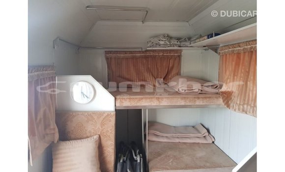 Buy Import Kia Carens White Car in Import - Dubai in Bumthang Buy Import Kia Carens White Car in Import - Dubai in Bumthang