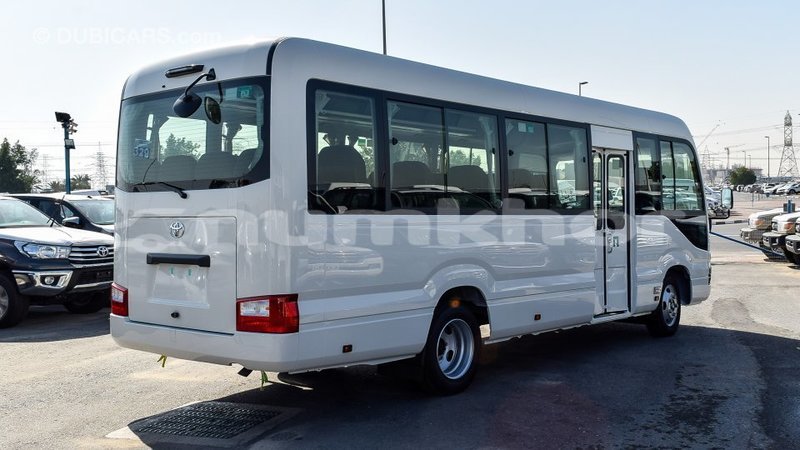 Big with watermark toyota coaster bumthang import dubai 2336