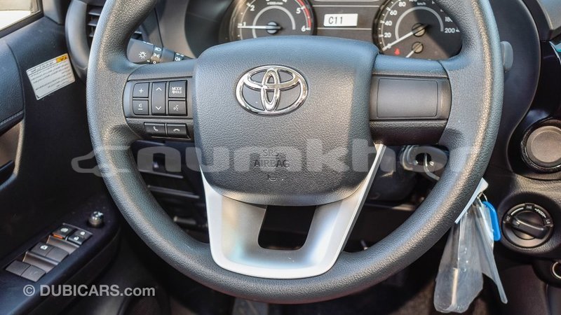 Big with watermark toyota hilux bumthang import dubai 2337