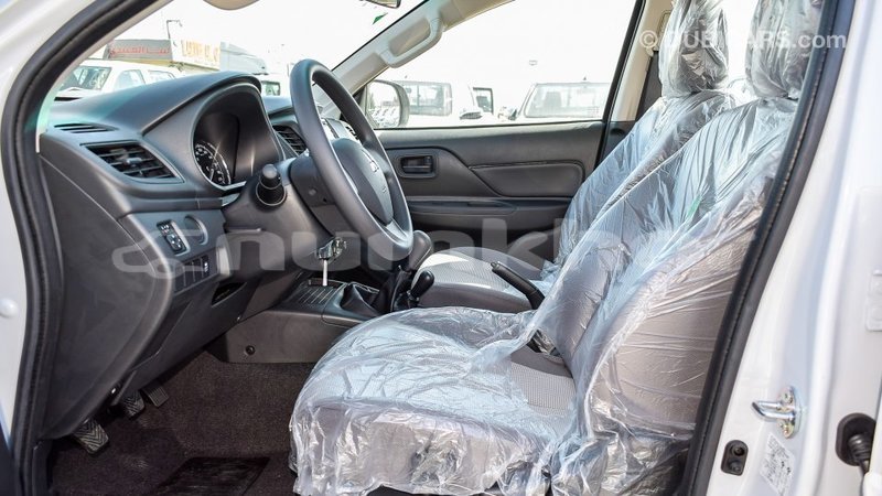 Big with watermark mitsubishi l200 bumthang import dubai 2339