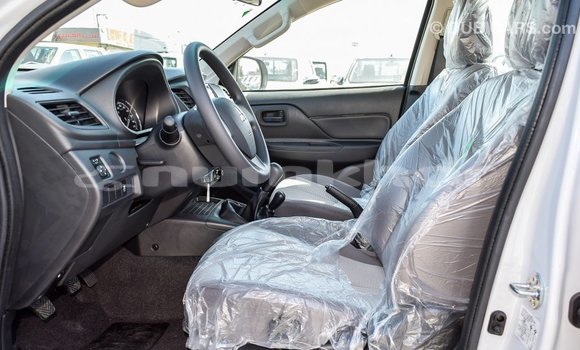 Buy Import Mitsubishi L200 White Car in Import - Dubai in Bumthang Buy Import Mitsubishi L200 White Car in Import - Dubai in Bumthang