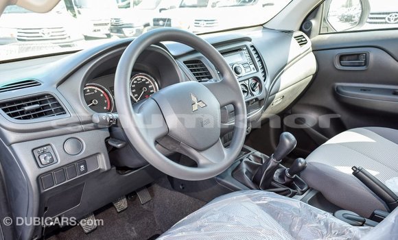 Buy Import Mitsubishi L200 White Car in Import - Dubai in Bumthang Buy Import Mitsubishi L200 White Car in Import - Dubai in Bumthang